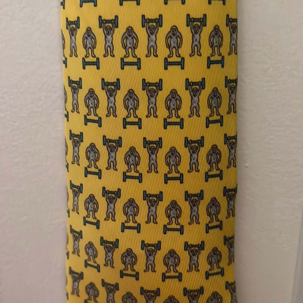 hermes necktie. bigfoot lifting weights